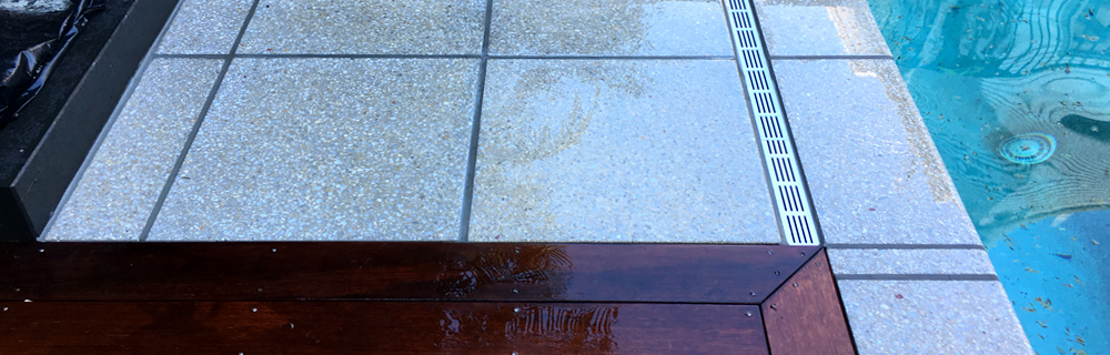 Poolside pavers and timber