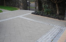 Adding new bassalt paver border to existing cobble stones